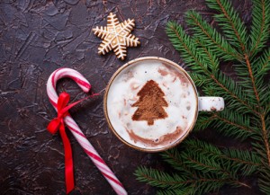 Christmas background with latte and gingerbread cookies